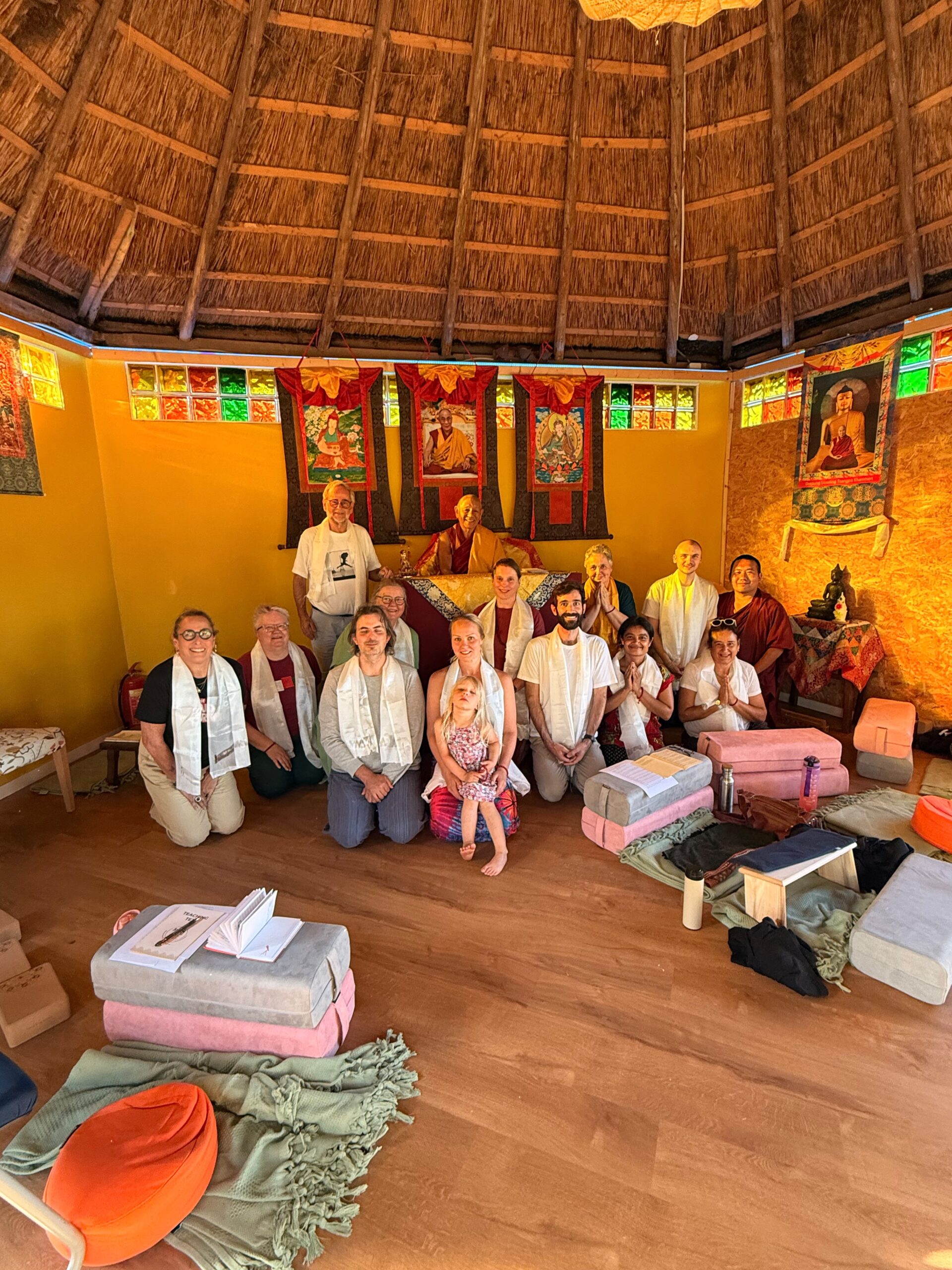 The 2026 retreat group with the teachers in the meditation hall at The Makers Barn